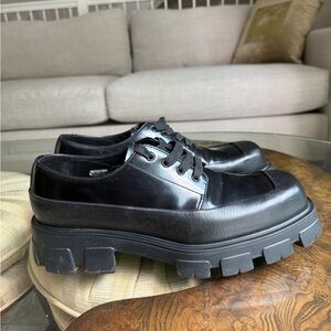 Prada
Monolith Brushed Leather Lace-Up Shoes